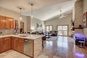 All new entrance and kitchen flooring. New backsplash and new quartz counters