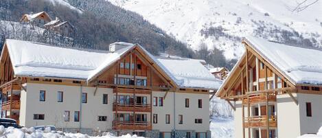 Unwind in your cosy apartment at this beautiful Savoyard-style chalet building.