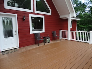Front Porch: Room for gathering and cooler storage