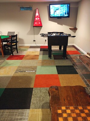 foosball, boss toss, cable TV, poker table and chess table