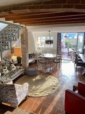 Groundfloor sitting room, chimney and dining area