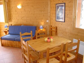 Settle into the dining area and enjoy a nice meal.