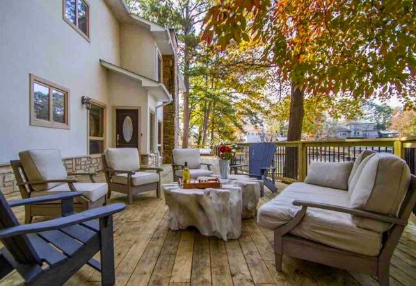 [Back Porch] Gather Around the Wood Burning Fire Pit and Make Memories that Last a Life Time with Your Loved Ones - Plenty of Seating for a Large Group.