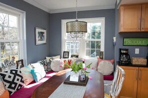 Lovely built in bench in open kitchen overlooking garden.