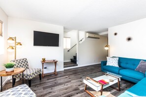 Stairs from the living room lead you up to the two bedrooms