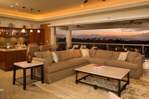 Spacious open floor plan affords our guests comfy seating, dining and views!