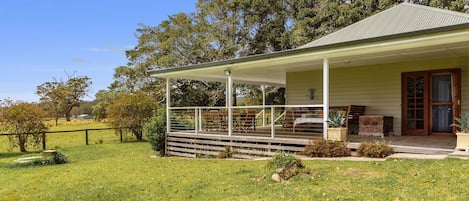Relax on the shady verandah of this classic homestead