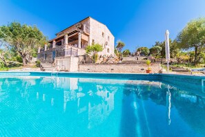 Rustic finca with terrace with mountain views.