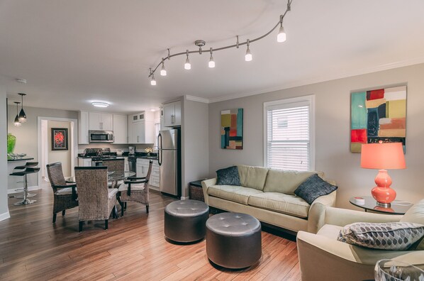 Open floor plan design with hardwoods and tiled flooring through out!