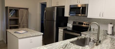 Enjoy this completely remodeled kitchen with every amenity! 