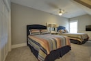 The Guest Bedroom includes two Queen sized beds, shared bath and Flat Screen TV.