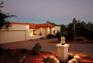 facing south at front of house, Rincon Mountains in the back ground. 
