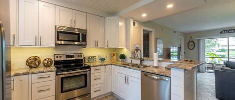 Up to date kitchen, ship lap, beautiful granite...