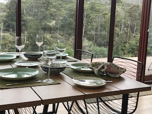 Dine in style and comfort by the river in mountain country