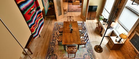 Full dining room and kitchen from loft.