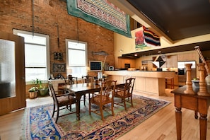 Plenty of room for guests to move about in dining room and kitchen.