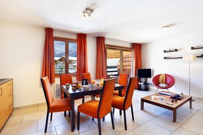 Reconnect with loved ones over a meal at the dining table.