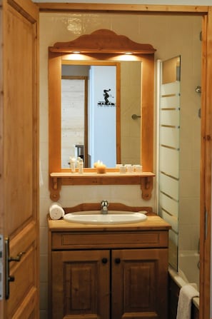 Get ready for your day in the lovely bathroom with shower.