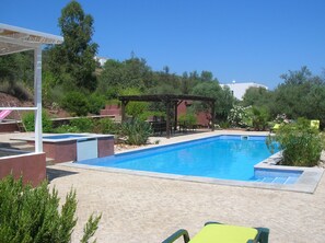 Fazendinha Guest House pool and double BBQ area near Tavira