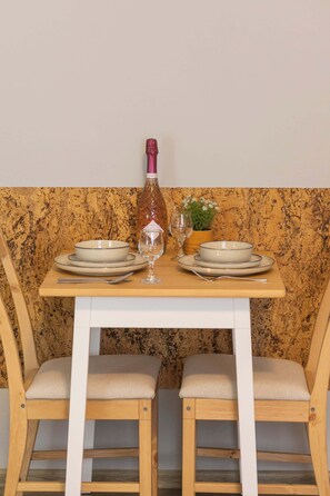 Functional dining area, where the guests can enjoy the meals prepared in the kitchenette.
