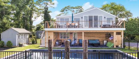 Deck overlooks the bay with plenty of lounging space both in the sun and shade.