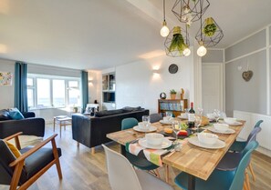 Beautiful open-plan living space with sea views.