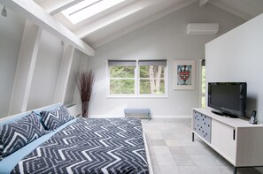 Master Bedroom with a King size bed, radiant heated floors, and Private Bathroom