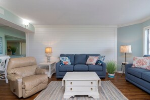 Living Room - A spacious and comfortable living room with available seating for the whole family!