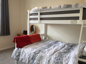 Large bedroom,  double bed with bunk above.  Large internet TV.  Dressing table.