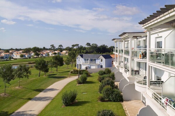 You will love the serene location, right on the golf course!