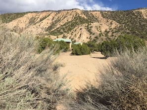 La Lomita is nestled against the Black Mesa.