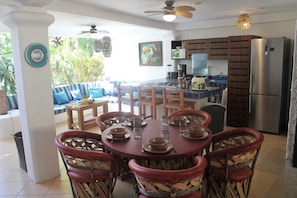 Lower level dining, kitchen and seating area.