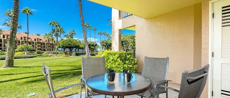 Large lanai with partial ocean view.