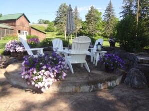 Flowers galore and a nice spot to sit.