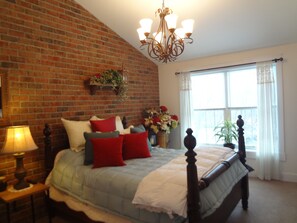 Master Bedroom, High Cathedral Ceilings, large windows and beautiful accent wall