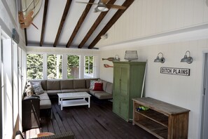 Lounge area in screened in porch