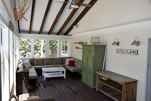 Lounge area in screened in porch
