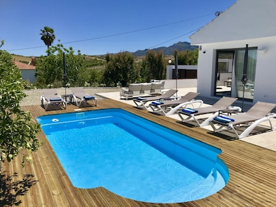 Modern luxury villa w/ stunning rural views, pool + roof terrace - 30m to coast 