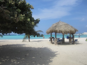 Rodgers' Beach, quiet, relaxing with sunshade from palapa's and trees