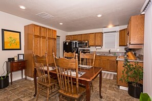 Eat in Kitchen with Coffee Microwave Toaster and room for a computer work area