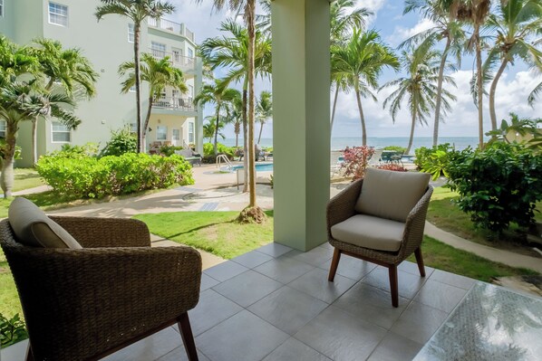 Enjoy ocean and pool views from your patio.