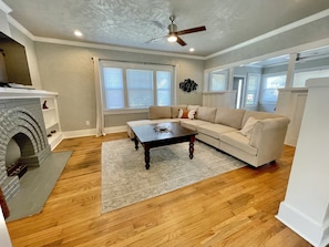 Living room with a new sectional and smart tv









