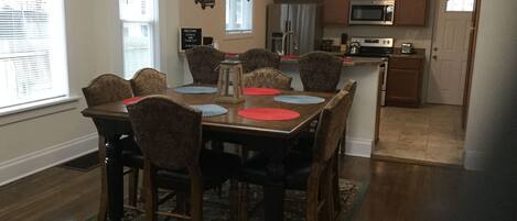 Large dining area perfect for family get togethers with open floor plan