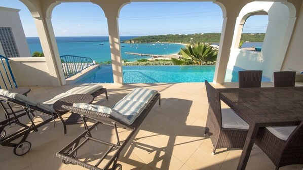 Spacious pool deck, infinity pool and the view!