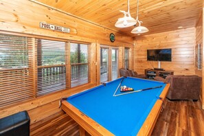 Rack 'em up! Get ready for some friendly competition with our top-notch pool table at Mountain Creek Lodge