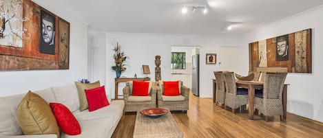 lounge/dining room with polished Bamboo flooring.