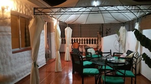 seating for at least 10 persons under lighted Gazebo + curtains for privacy 