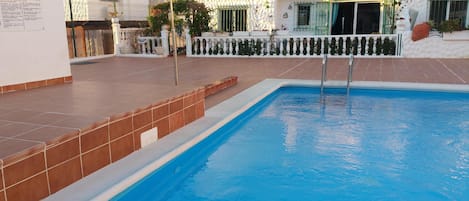 front view of Bungalow / Villa in front of pool