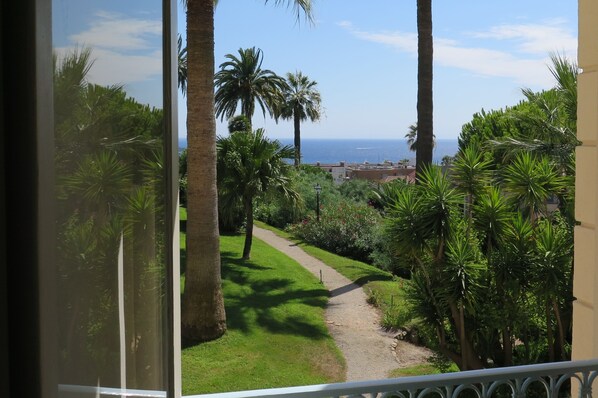 View over the gardens to the Mediterranean .
