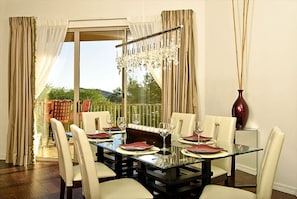 Dining area with sliding doors to the outdoor eating area.